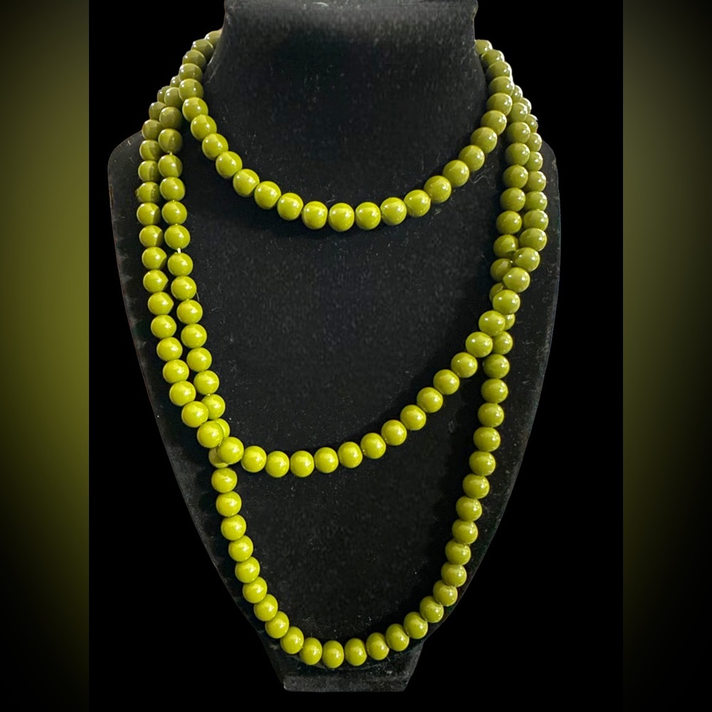 Vintage extra long strand of olive beads, great little detailed clasp 52”